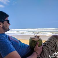 Silviu drinking a coconut