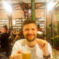 Silviu enjoying a fresh beer in Minh Hien vegetarian restaurant