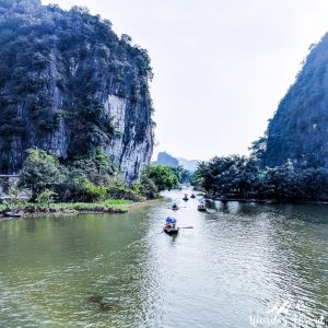 Boat tours passing by Tam Coc river