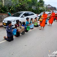 Monks redistributing their donations to people in need