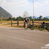 Perine stopping in front of an airfield; a paramotor takes off there!