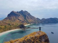 Silviu posing on Padar island after hiking to one of the peaks.