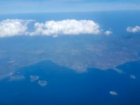 Head over clouds, small islands on our way to Flores island.