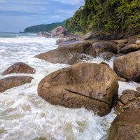 The trail is behind those rocks...