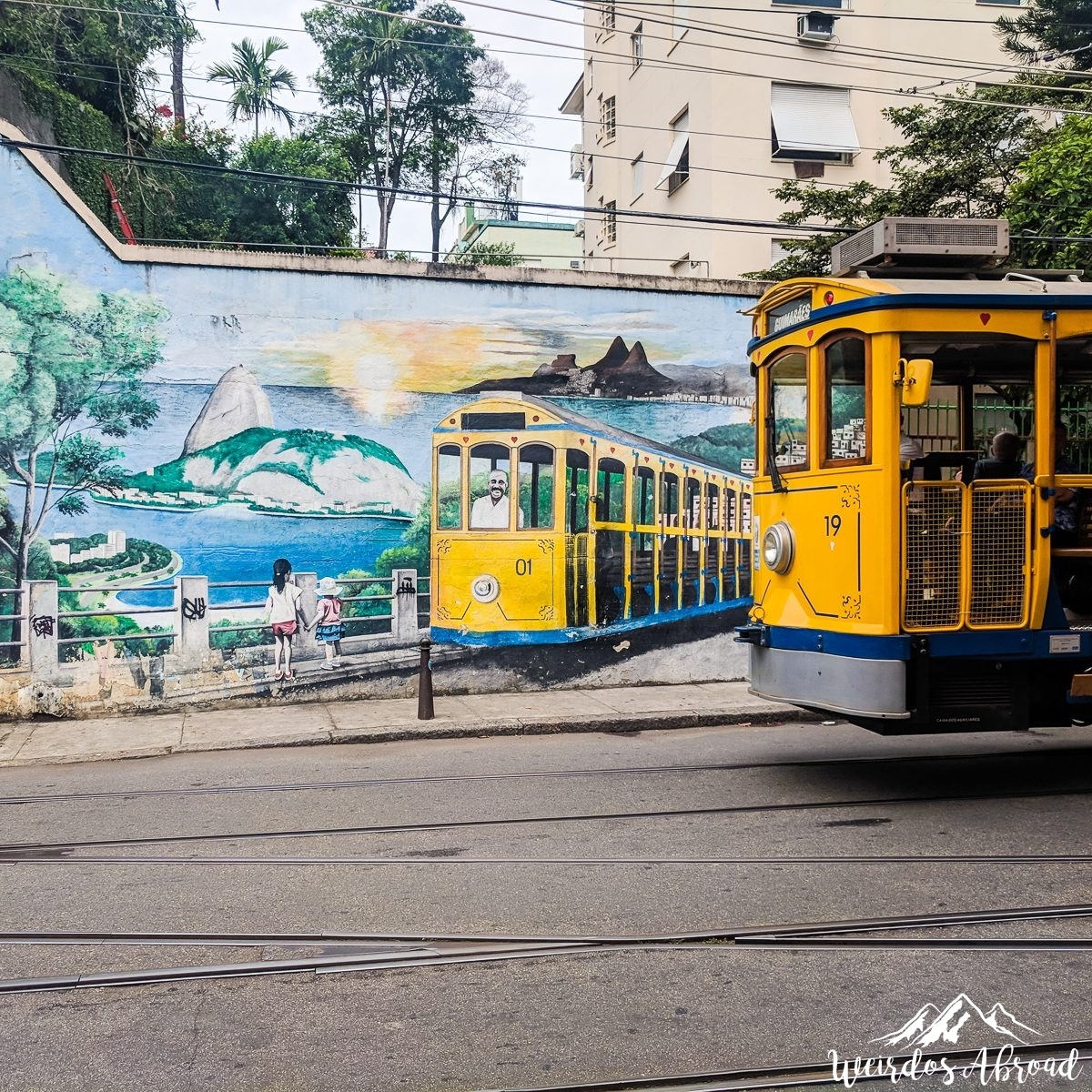 Tourists on the main strip of Santa Teresa on south coast of the